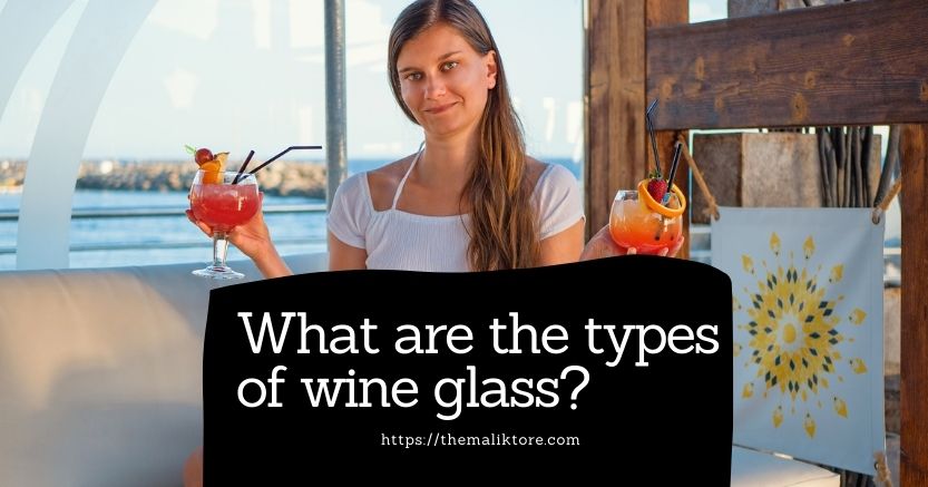 holding wine glass